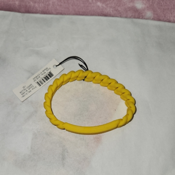 Marc Jacobs Jewelry - MARC JACOBS NWT Yellow Twisted Bracelet